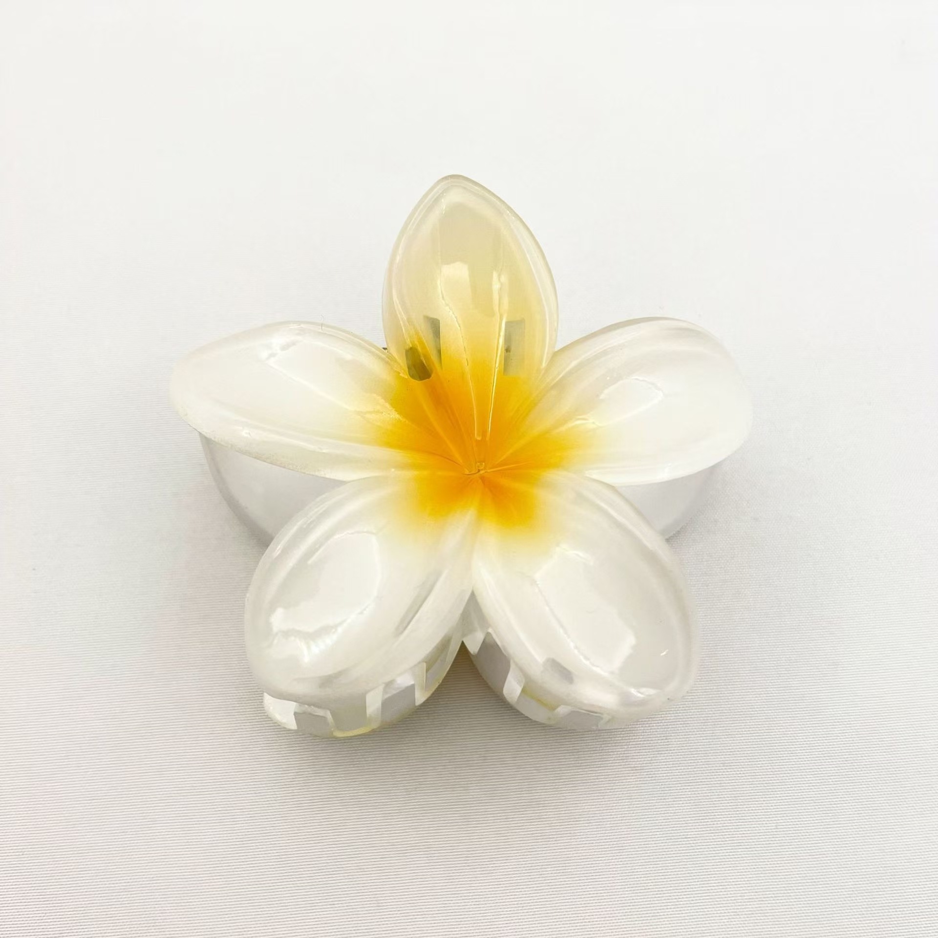 White with yellow heart