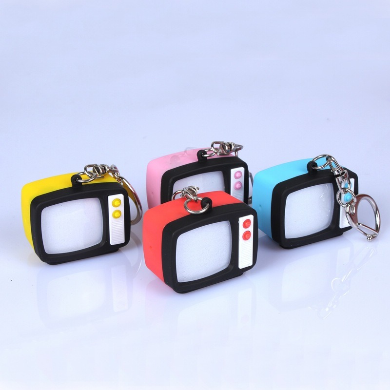 Creative-TV-LED-sound-and-light-keychain-small-toy-small-hanging-machine-simulation-TV-gift-1.jpg TV LED sound and light keychain - Image 1
